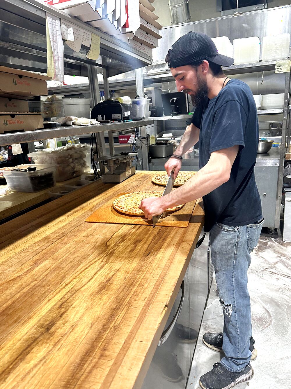 Cutting a fresh pie in the Camillus kitchen