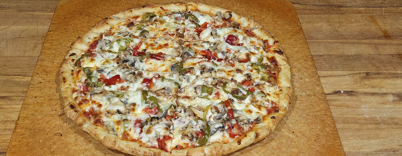 Specialty pizza loaded with toppings